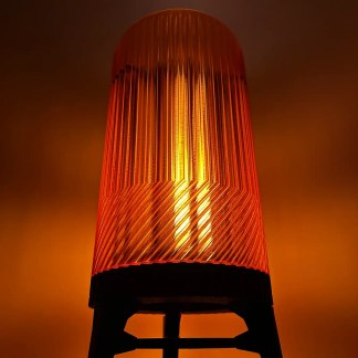 Modern 3D-printed LED lamp with a sleek ribbed surface, ideal for stylish home decor.