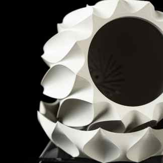 Highly detailed 3D printed gear sculpture with intricate design, created using cutting-edge 3D printing techniques by AM Square 3D.