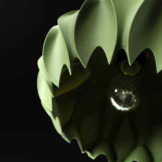 Sharp, detailed close-up of a green 3D-printed plant decorative on black background.