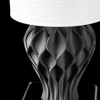 A sleek, black 3D-printed lamp featuring an intricate, geometric filigree design, perfect for modern interior decor.