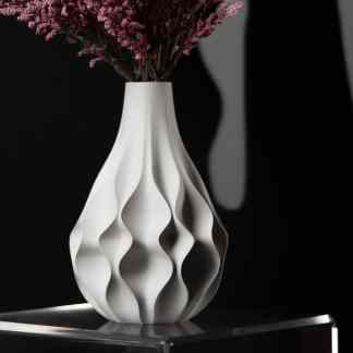 3D printed ornamental vase with textured wave design, perfect for contemporary home decor.