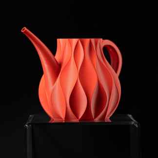 Highly detailed 3D printed teapot with intricate, flowing design, demonstrating innovative 3D printing technology.