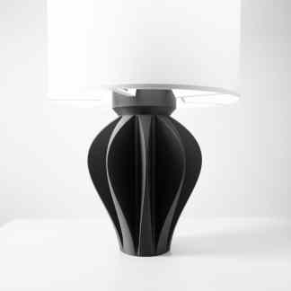 Sleek black designer table lamp with contemporary style, perfect for home decor and interior design.