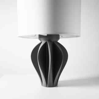 Sleek black and white 3D-printed table lamp designed with intricate details by AM Square 3D.