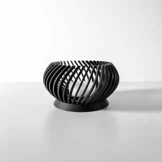 Stylish black 3D-printed candle holder with curved, artistic design for contemporary interior decor.