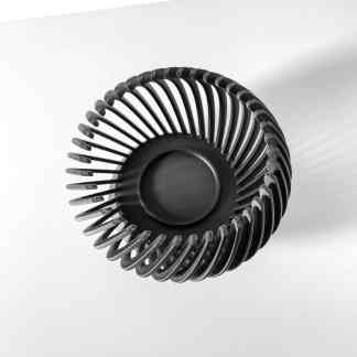 High-resolution monochrome image of a 3D printed turbine blade, emphasizing precision and design details.