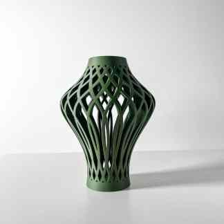 3D printed green vase with an elaborate lattice pattern, showcasing advanced design and printing technology.