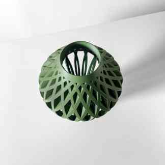 Advanced 3D-printed green geometric sculpture with complex lattice design, demonstrating cutting-edge 3D printing technology.