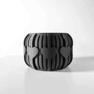 Elegant black 3D printed heart-shaped candle holder with intricate geometric lines for stylish home decor.