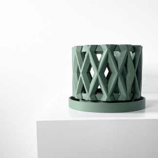 3D printed planter, geometric design, modern decor, green color, artistic home accessory.