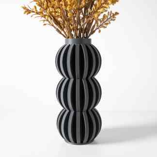 3D printed vase with layered spherical pattern, ideal for contemporary home decor and floral arrangements.