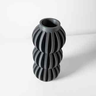 Sleek black 3D-printed vase with a modern, geometric design, perfect for contemporary home decor.