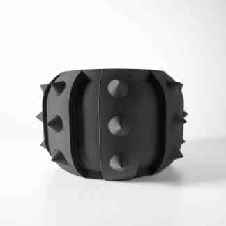 High-quality black 3D printed object with spikes, showcasing innovative design.