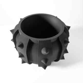 High-quality 3D printed rubber wheel with spikes, ideal for industrial or artistic applications.