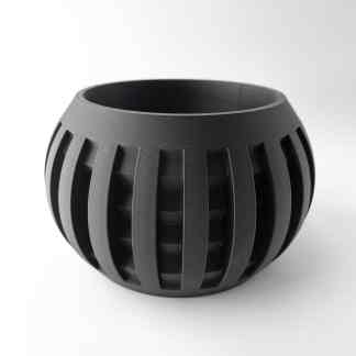 Detailed black 3D-printed sphere with vertical slats, showcasing advanced additive manufacturing.