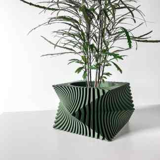 Vase with intricate geometric fold design, suitable for indoor or outdoor plants. Modern, artistic, and durable 3D printed decor.