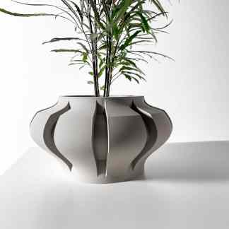 Unique 3D-printed ceramic planter with artistic design for stylish interior decor.
