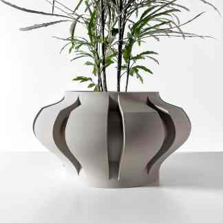 3D printed flower pot with unique, contemporary geometric style, perfect for modern interior decor.