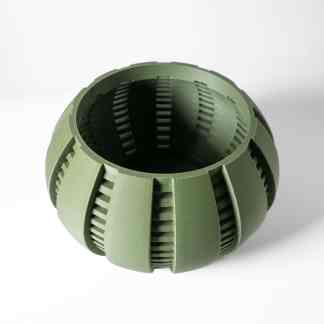 High-quality green 3D printed mechanical part with intricate design and detailed construction.