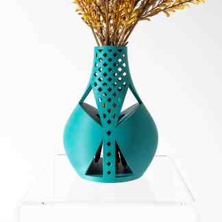 3D printed turquoise decorative vase with geometric cutouts for home decor.