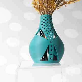 3D printed vase with geometric cutout design, modern decor piece in vibrant blue.
