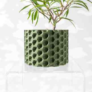 Modern 3D-printed hexagon pattern planter for indoor plants, eco-friendly design.