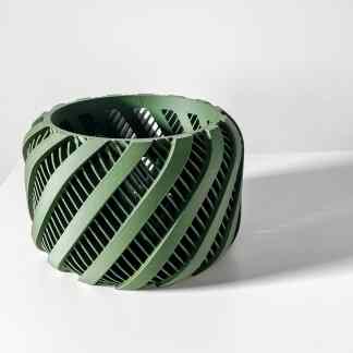 High-quality 3D printed green mechanical part showcasing complex lattice structure.