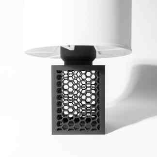 A close-up of a modern 3D-printed ventilation cover with hexagonal pattern, showcasing innovative design and precision.