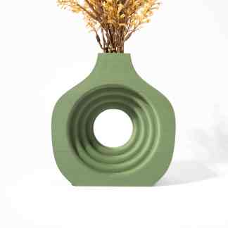 Decorative 3D printed green vase with unique circular concentric design, ideal for stylish home accents.