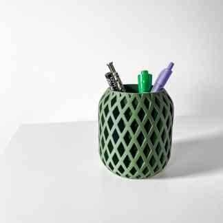 A modern 3D-printed green pen holder with geometric cutouts, ideal for organizing pens, markers, and stationery.