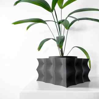 A modern, 3D printed planter showcasing innovative curvy design for stylish home decor.