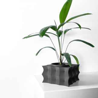 Stylish 3D printed planter with sleek geometric design, perfect for modern interior decor.