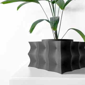 3D-printed sculptural planter with unique geometric design, ideal for contemporary interior decor.