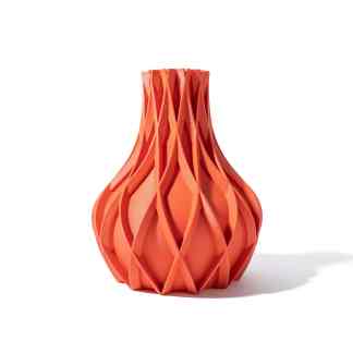 Bright orange 3D printed vase showcasing complex geometric patterns and craftsmanship.