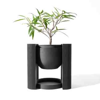 Stylish black plant holder with textured design, ideal for modern interior or outdoor garden spaces.