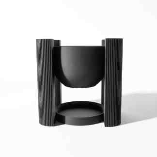 Sleek black 3D-printed stand with ribbed texture and circular base, ideal for modern decor or product presentation.