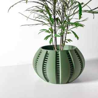 3D printed modern green flower pot with unique design for home décor and gardening.