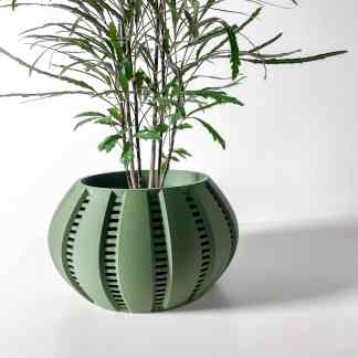 3D printed green planter with detailed slotted design, perfect for stylish home or office plant display.