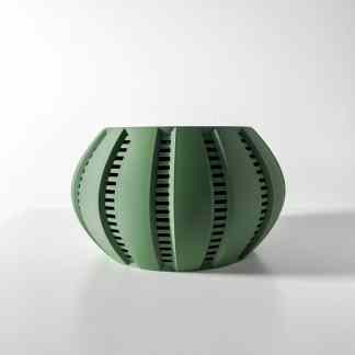Detailed 3D printed green vase with open design and curved lines.