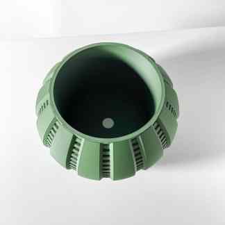 High-resolution 3D printed mechanical component in green color for industrial prototypes.
