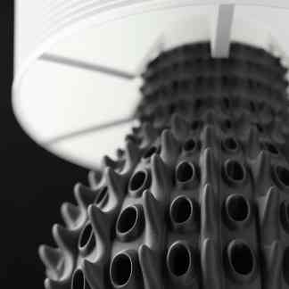 Sleek black and white 3D-printed abstract art focused on modern design.