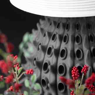 High-resolution 3D-printed vase with textured geometric patterns, perfect for modern home decor.