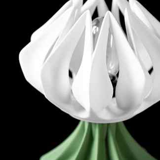 A close-up of a contemporary 3D printed white floral lamp with intricate petal details on a black background.