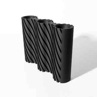 High-quality 3D printed black sculpture with intricate wavy design.