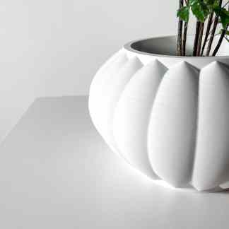 Sleek white 3D-printed vase with geometric design, perfect for home decor and plants.