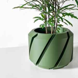 3D printed green planter featuring a contemporary geometric design for elegant home and garden decoration.