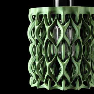 High-quality 3D printed green lamp with unique lattice design, showcasing advanced technology.