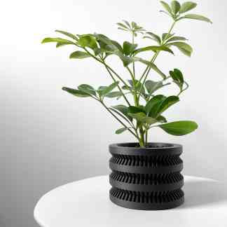 Custom 3D-printed plant pot with geometric design, perfect for home decor and plant display.