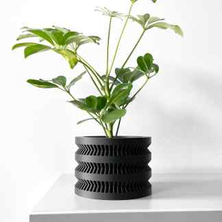 Stylish 3D-printed plant pot with geometric patterns, perfect for modern home decor and植物展示。.