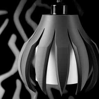 Stylish 3D printed lamp showcasing intricate geometric design for contemporary decor.